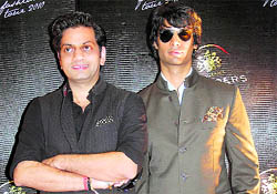 Raghavendra Rathore(L) with a model