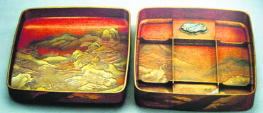 Writing Box. Lacquer with applied decoration in silver and coral