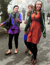 Tourists enjoy pleasant weather at McLeodganj on Sunday. 