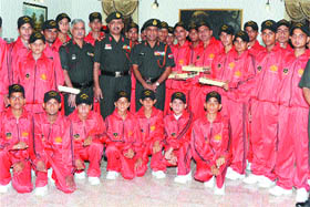 GOC of Vajra Corps Lieut-Gen Ramesh Halgali poses with schoolboys from Jammu and Kashmir who came to Jalandhar under Operation Sadbhavana. 