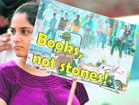 A girl during a protest against Kashmir violence, in New Delhi on Sunday