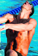 Michael Phelps makes his start on the way to fourth place finish in the men's 200m backstroke final at the U.S. National Swimming Championship in Irvine, California, on Saturday