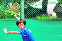 A player in action during the tennis match at the CLTA, Sector 10, in Chandigarh