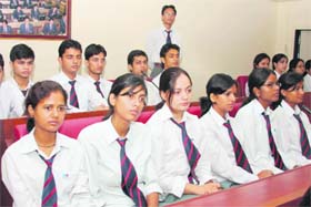 Participants at a seminar on renewable energy resources at Graphic Era University in Dehradun