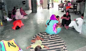 In the absence of proper sitting arrangements, visitors and attendants of patients have to squat on the floor at the maternity ward of the Civil Hospital, Karnal.