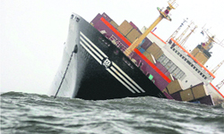 Outbound cargo vessel MSC Chitra submerges after a collision with stationary MV Khalijia-III in the sea off the Mumbai coast on Monday.