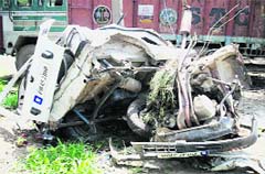Mangled remains of a car in which four of a family from Ludhiana got killed in an accident at Mandi Gobindgarh