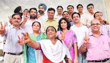 Jaspal Kaur Kang (in white dupatta), along with other elected members, outside the Law Auditorium in Panjab University on Tuesday. 