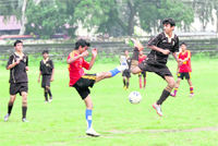 A match of the under-16 district-level football tournament in progress in Dehradun 