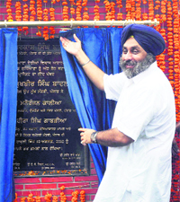 Deputy CM Sukhbir Badal unveils the foundation stone of a GLADA project in Ludhiana on Tuesday.