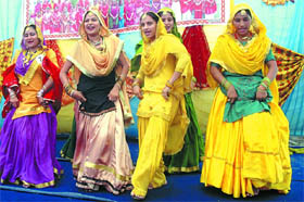 Girls performing a dance during the Teej celebrations at the Swami Vivekananda College in Bathinda on Wednesday. Aman Preet and Gagan Deep were declared Mrs & Miss Teej, respectively duirng the function. 