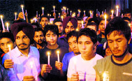 PUSU members take out a candlelight march in the memory of those who lost their lives in Leh tragedy, in Mohali