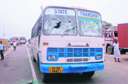 One of the buses damaged during a protest by residents of Tahkhana village against erratic power supply in Karnal 