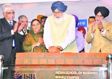 Punjab Chief Minister Parkash Singh Badal lays the foundation stone of the Indian School of Business at Mohali on Wednesday.