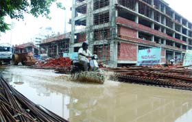 The waterlogged construction area at Shivaji Stadium in New Delhi