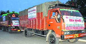 Trucks loaded with relief material near the Dera Sacha Sauda headquarters at Sirsa.