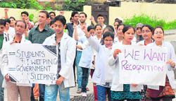 Students of Indira Gandhi Government Dental College hold a rally in Jammu on Thursday.