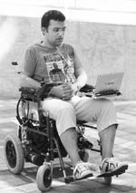 Anton Plotkin, a member of a research team at the Weizmann Institute of Science, demonstrates the navigation of a wheelchair using a "sniff controller" device in Rehovot near Tel Aviv. The device that detects the subtle movements needed to sniff air through the nose or mouth can steer a wheelchair or allow completely paralyzed people to type messages, Israeli researchers at the Institute said