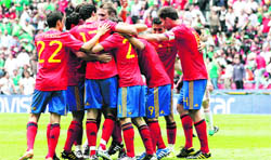 Spanish players celebrate David Silvas goal on Wednesday