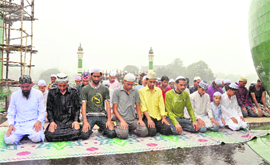 Devotees offer Friday prayers amid heavy rain at Jama Masjid, Dehradun,