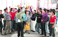 NSUI members raise slogans against the MPG College administration in Mussoorie. 