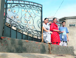 A small wall constructed by residents of Nanak Nagar, Sector 7, to prevent drain water from entering their houses.