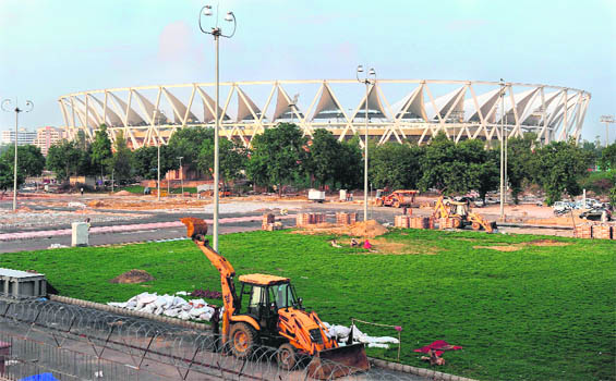 Construction continues around the newly inaugurated Jawaharlal Nehru Stadium in New Delhi