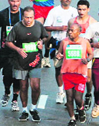 Anil Ambani (L) jogs diligently 5-6 km six days a week