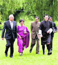 STRENGTHENING TIES: Bhutan King Jigme Khesar Namgyel Wangchuck (right) with National Security Adviser Shivshankar Menon (left), Foreign Secretary Nirupama Rao and Indian Ambassador to Bhutan Pavan K Verma in Thimphu on Friday.