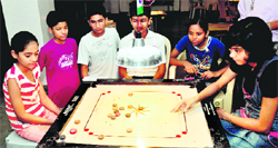 Players in action during the 20th Chandigarh State Carrom Tournament