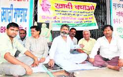 Owners of Khadi Ashram Stock hold a protest in Haridwar