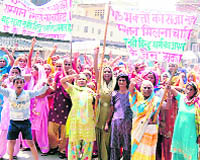 Women stage demonstration in Jhajjar on Monday.
