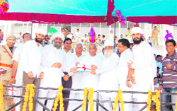 Members of a panchayat receive citations from Transport Minister Om Parkash Jain during the Independence Day function in Sirsa.