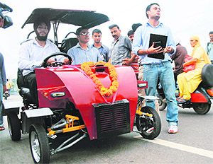 Developed by students of Guru Gobind Singh Engineering College, a small car, Axis-RO, on a trial run in Jammu on Monday.
