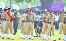 An NCC cadet relaxes after a tiring day during the Independence Day function in Ludhiana