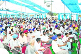 A section of the gathering at a function held in memory of Shaheed Karnail Singh in Issru village