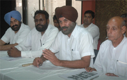 Congress leaders from Malout addressing a press conference in Bathinda