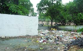 Garbage near a residential block in Pragati Vihar Hostel that houses government officer flats in New Delhi