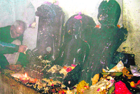 A priest worships the deity in Mussoorie on Tuesday.