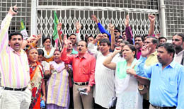UKD workers hold a protest in front of the office of the Dehradun District Magistrate on Tuesday