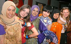 Students belonging to different countries pose for a photograph during the Global Village Fair at Lovely Professional University. 