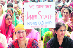 Members of the Panun Kashmir stage a demonstration in front of Raj Bhavan in Jammu