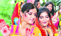 Students of the Arya College for Women celebrate teej festival in Ludhiana.