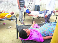 Villagers undergo treatment at Bhamarsi village in Fatehgarh Sahib. 
