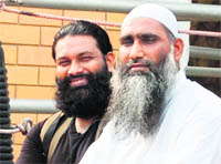 Mohammad Asif (left) and Haji Mohammad Iqbal Khokhar on the way to the Attari-Wagah joint checkpost on Wednesday.