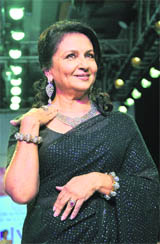 Bollywood actress Sharmila Tagore walks the ramp at the India International Jewellery Week 2010 in Mumbai late on Wednesday.