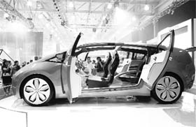 Motoring enthusiasts and car-buyers look at a Toyota Hybrid X on display during the 3rd Philippine International Motor Show at World Trade Center in Pasay City, Metro Manila, on Thursday.