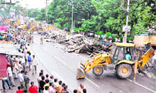 JCB machines raze an illegal market near the Shiv Moorti-City Kotwali stretch in Haridwar on Thursday.