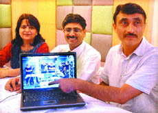 Dr Raman Chawla, Director of Chawla Heart Care Centre, shows the MOT on a laptop. 