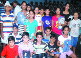 The winners of the district badminton championship in Jalandhar on Thursday. Tribune photo: Malkiat Singh